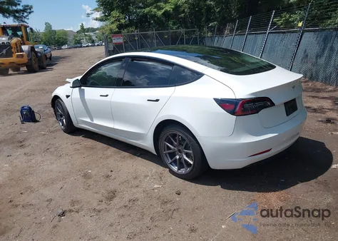 2022 Tesla Model 3 Rear-Wheel Drive from USA, damaged, VIN 5YJ3E1EA9NF321212